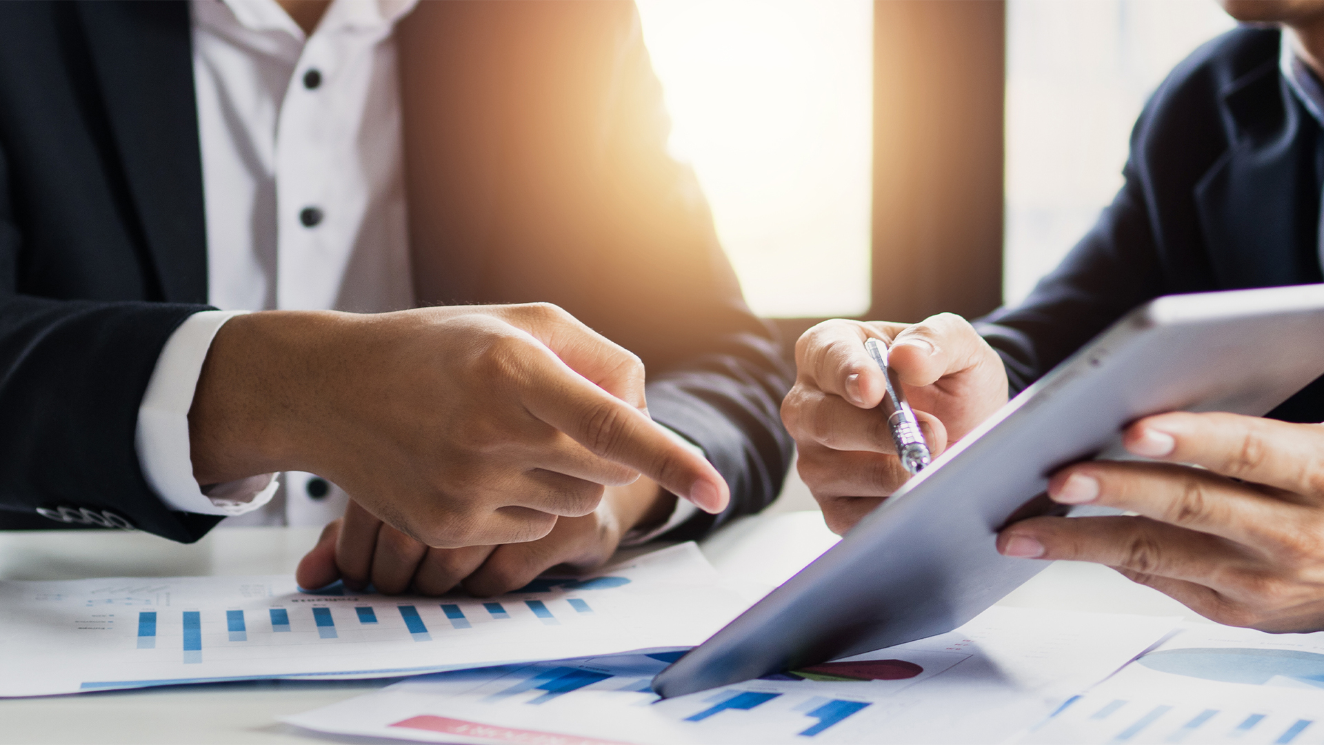 legal and businessman advisor, two business people talking, planning analyze investment and marketing on tablet in office.