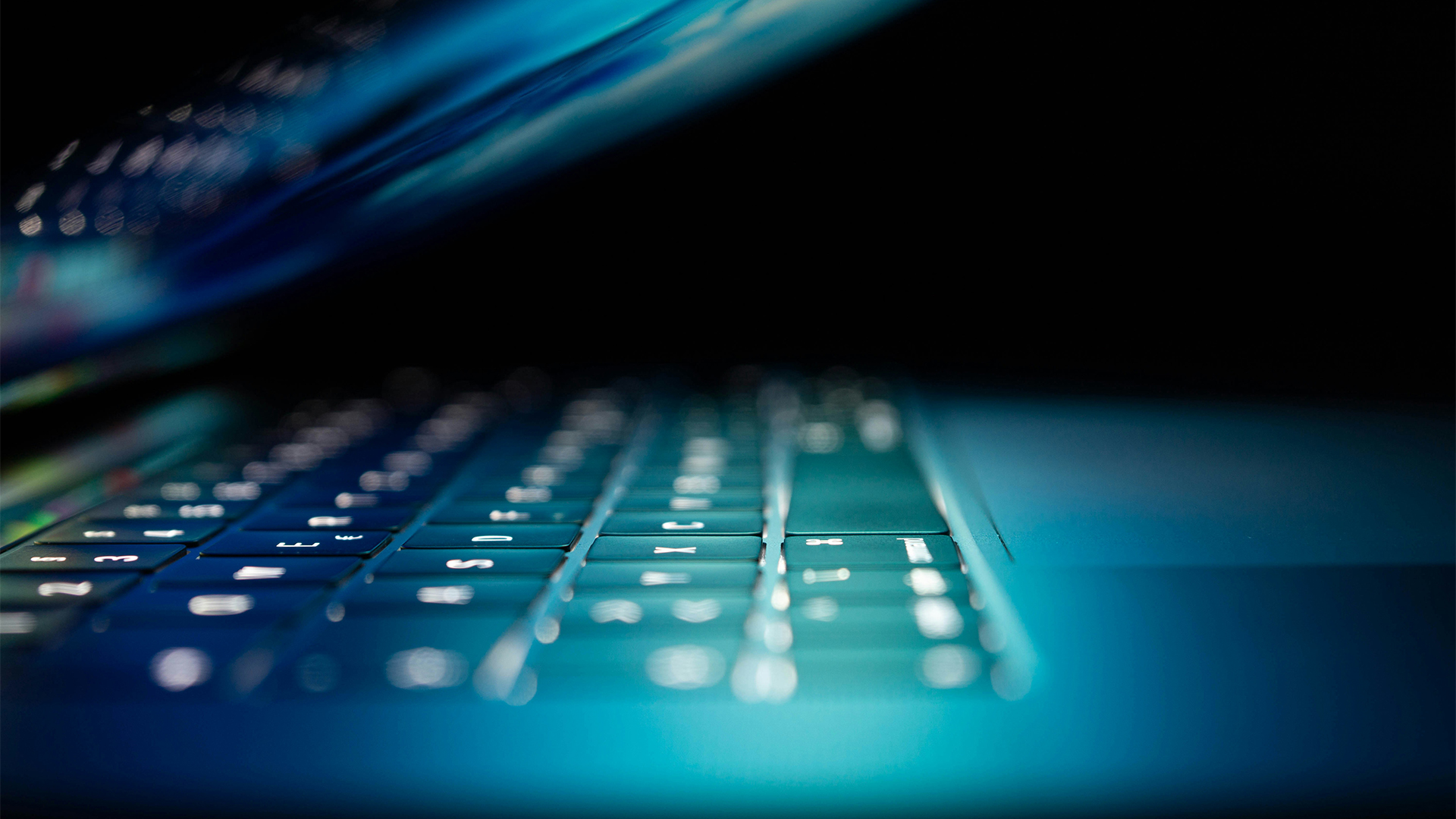 laptop with screen almost closed