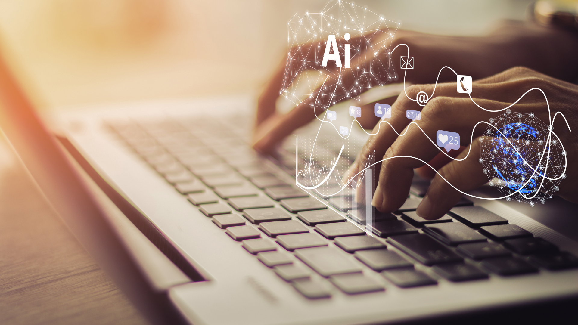 Hands typing on laptop keyboard